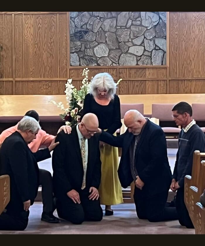 Prayer and fellowship at church