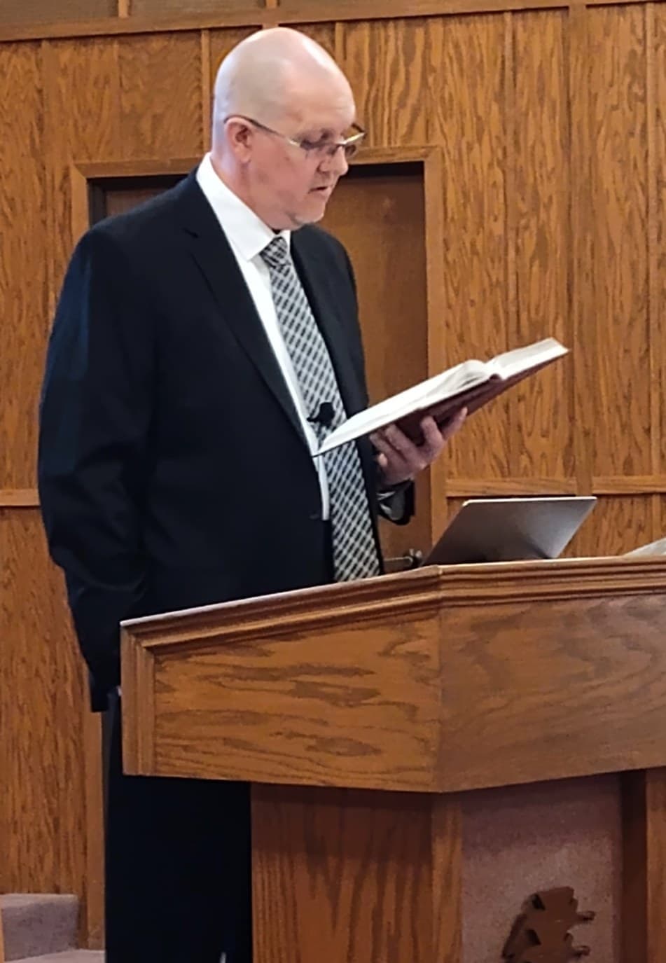 Wylie preaching from the pulpit